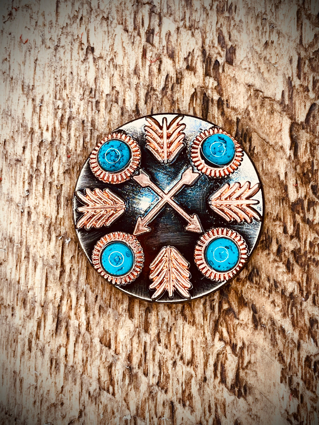 1.5” copper cross arrow concho with turquoise color stones