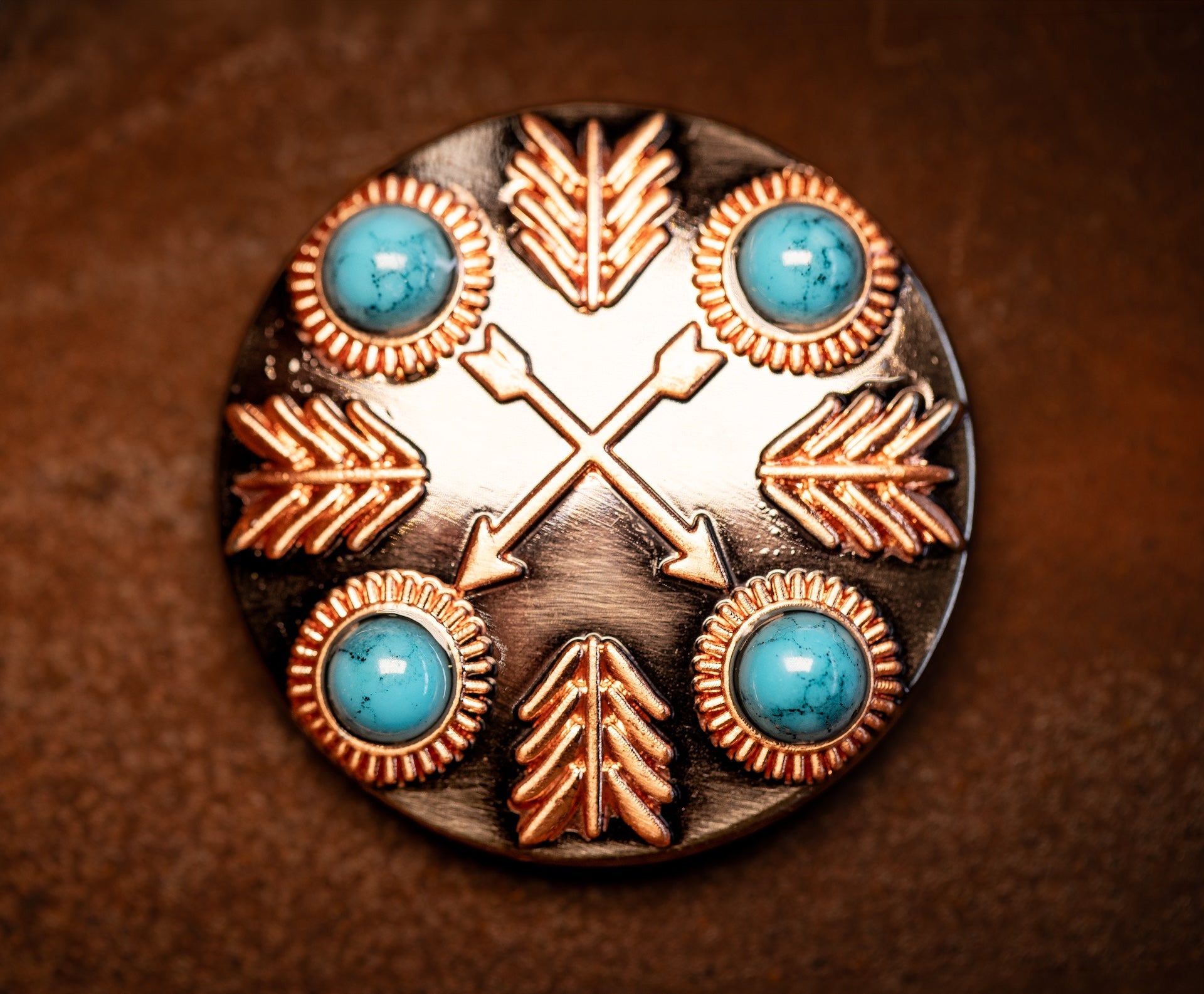 1.5” copper cross arrow concho with turquoise color stones