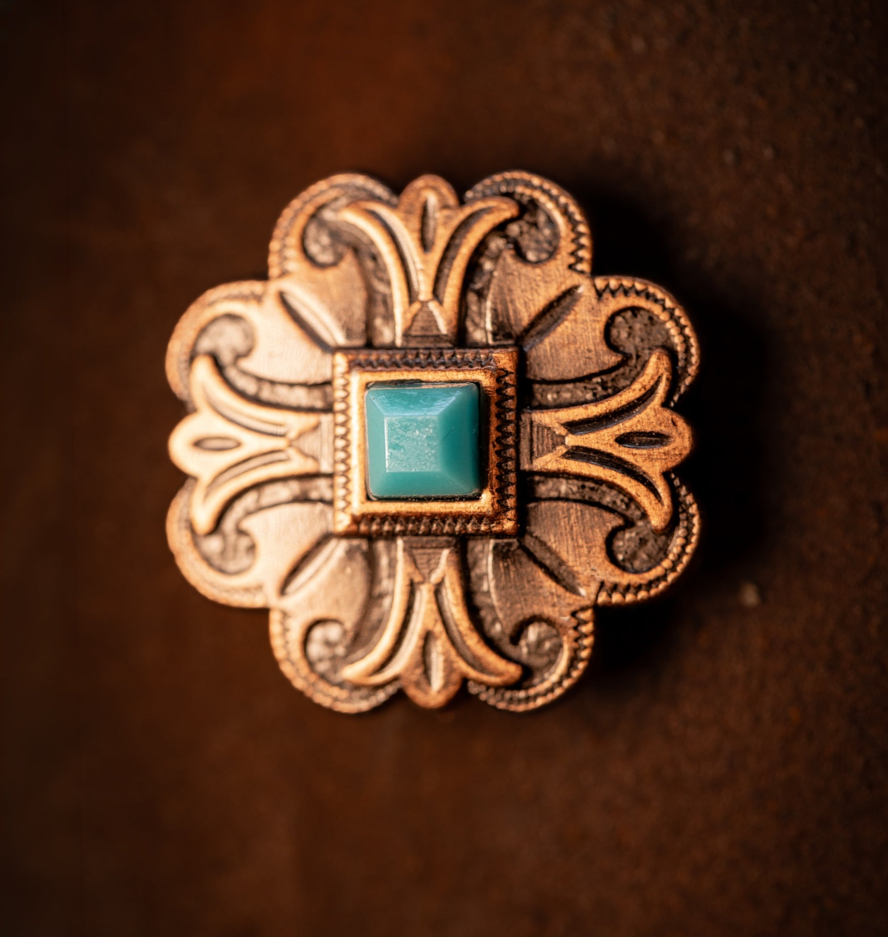 1” copper floral Concho with turquoise color stone