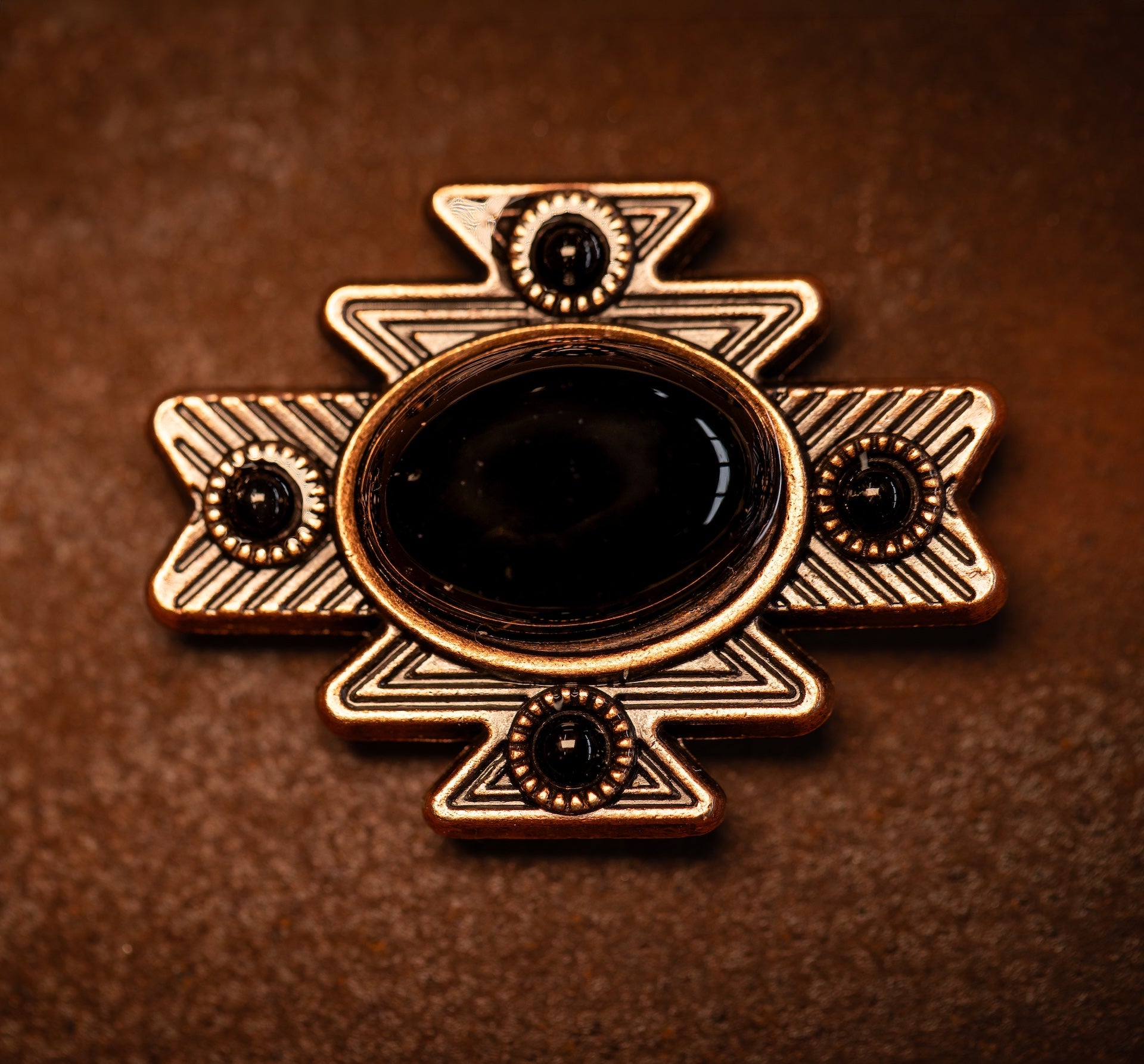 1.5” Copper Aztec conchos with black stones