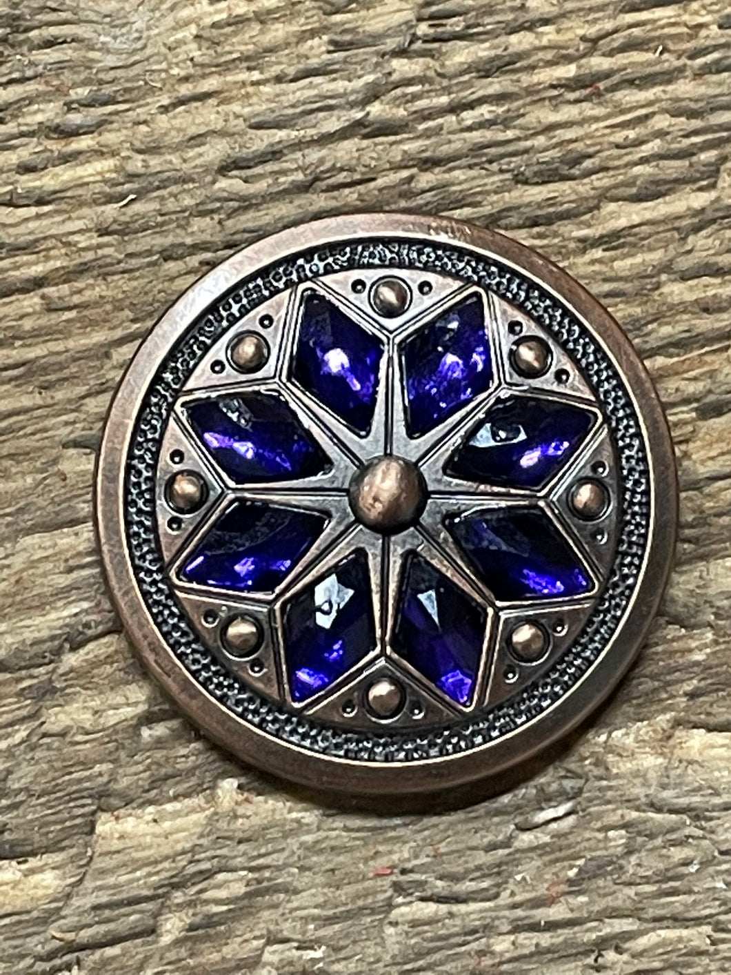 1.5” copper cactus flower concho with deep purple stones